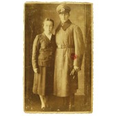 German soldier from Bavaria in overcoat with wife